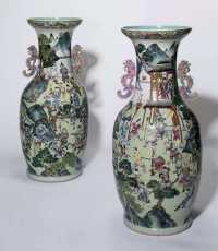 EARLY 19TH CENTURY A PAIR OF LARGE CANTON FAMILLE ROSE TWO-HANDLED VASES